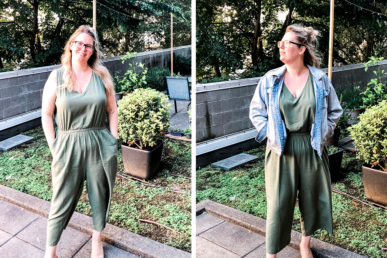 Jehn is wearing an olive green wide leg sleveless jumpsuit standing in her backyard