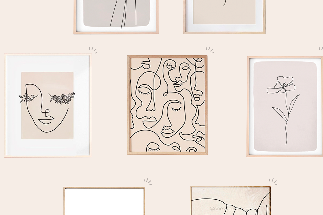 A curated collection of etsy line art prints of flowers and faces in light wood frames